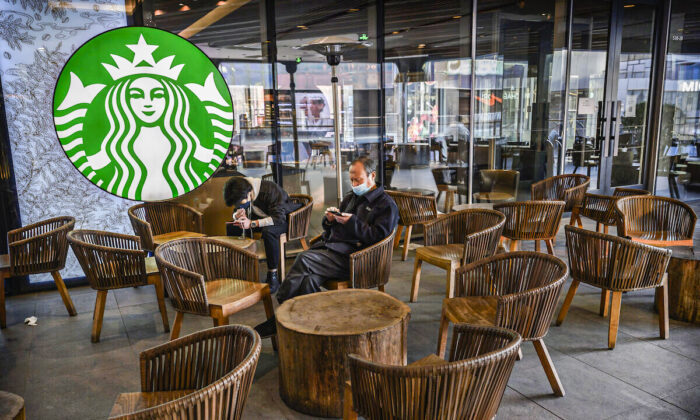 Customers sit in a nearly empty Starbucks in Beijing, China on March 10, 2020. (Kevin Frayer/Getty Images)