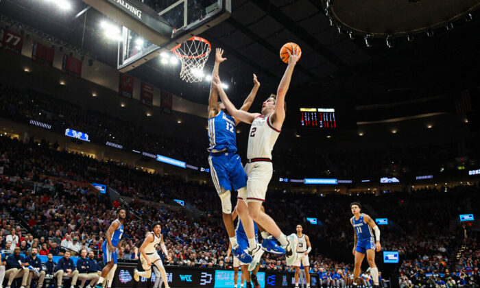 Drew Timme #2 of the Gonzaga Bulldogs goes up for a shot against DeAndre Williams #12 of the Memphis Tigers during the second half in the second round of the 2022 NCAA Men's Basketball Tournament at Moda Center, in Portland, Oregon, on March 19, 2022. (Ezra Shaw/Getty Images)