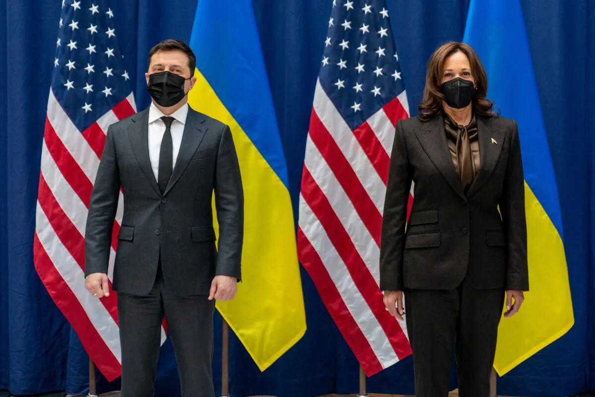 U.S. Vice President Kamala Harris and Ukrainian President Volodymyr Zelensky pose for photographs before a meeting at the Munich Security Conference in Munich on Feb. 19, 2022. (Andrew Harnik/Pool/AFP via Getty Images)