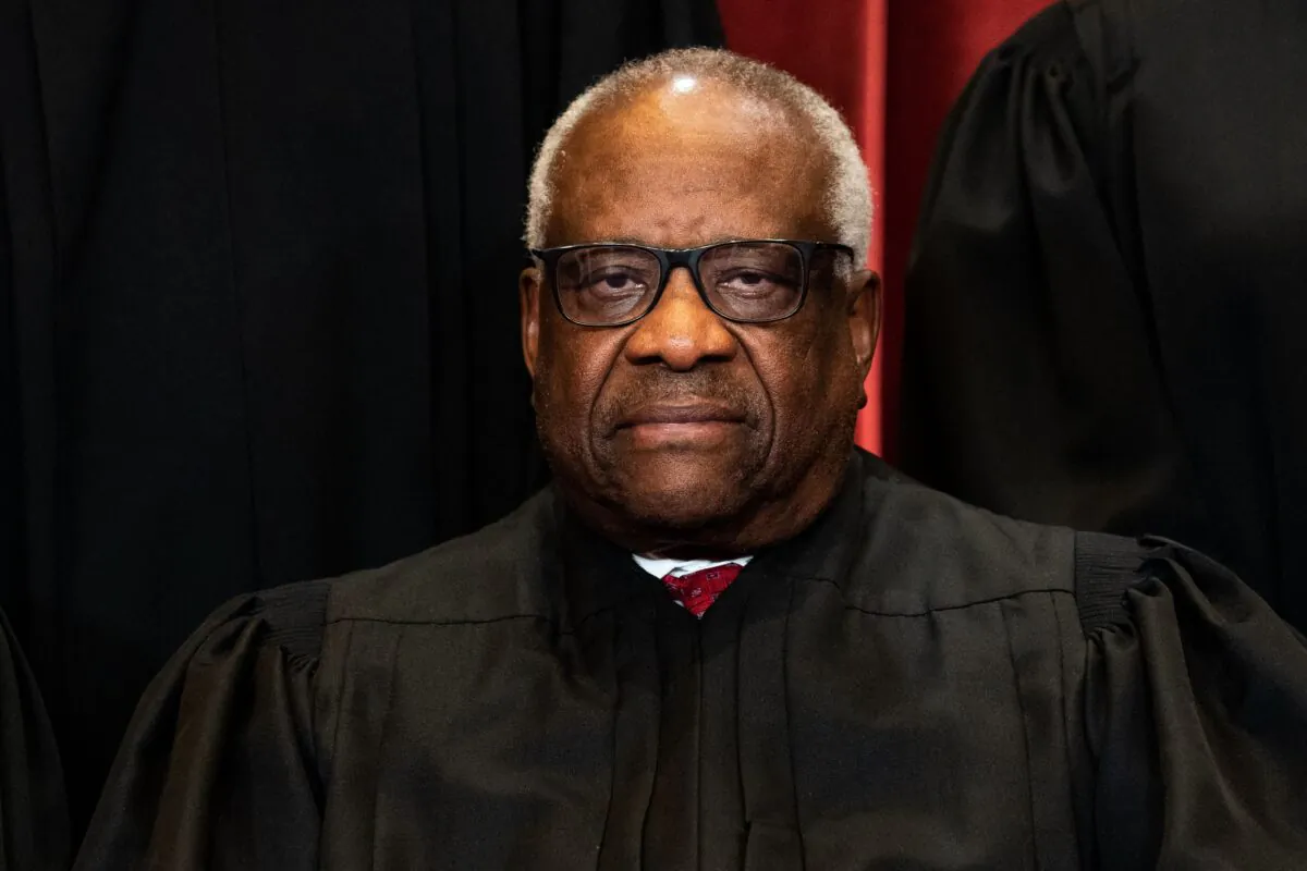 Associate Justice Clarence Thomas sits during a group photograph of the justices at the Supreme Court in Washington on April 23, 2021. (Erin Schaff/Pool/AFP via Getty Images)