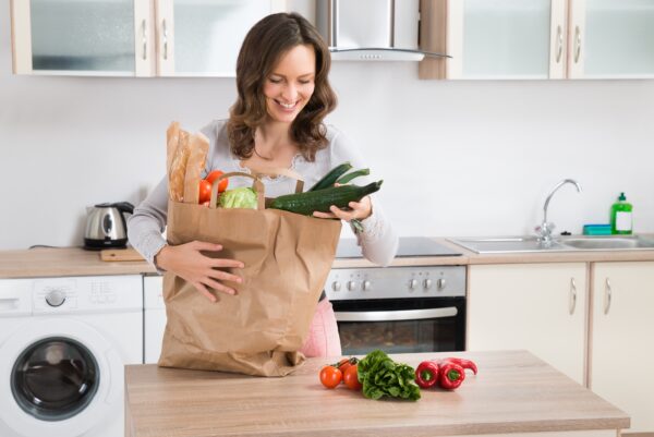 woman with healthy groceries