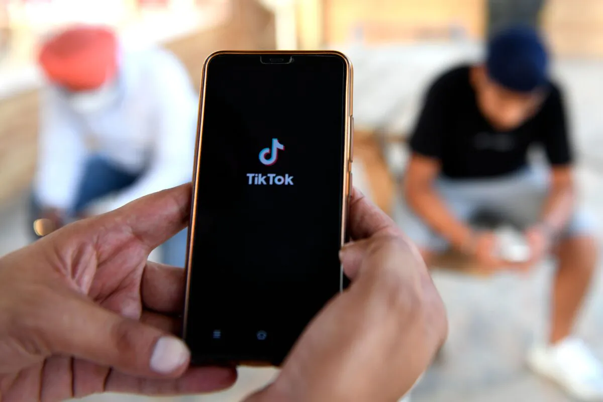Users browse through the Chinese-owned video-sharing TikTok app on a smartphones in Amritsar, India, on June 30, 2020. (Narinder Nanu/AFP via Getty Images)
