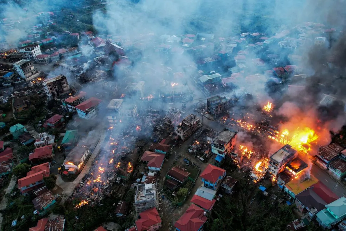 Smokes and fires from Thantlang, in Chin State, Burma, where more than 160 buildings were destroyed by shelling from Junta military troops on Oct. 29, 2021, according to local media. (STR/AFP via Getty Images)