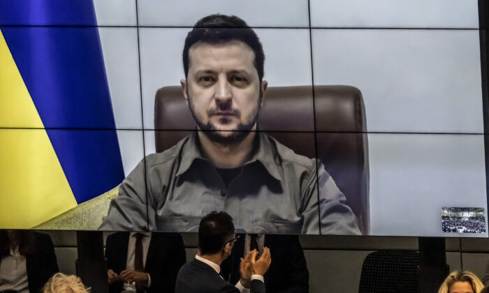 Ukrainian President Volodymyr Zelenskyy addresses the Bundestag via live video from the embattled city of Kyiv in Berlin, Germany, on March 17, 2022. (Hannibal Hanschke/Getty Images)