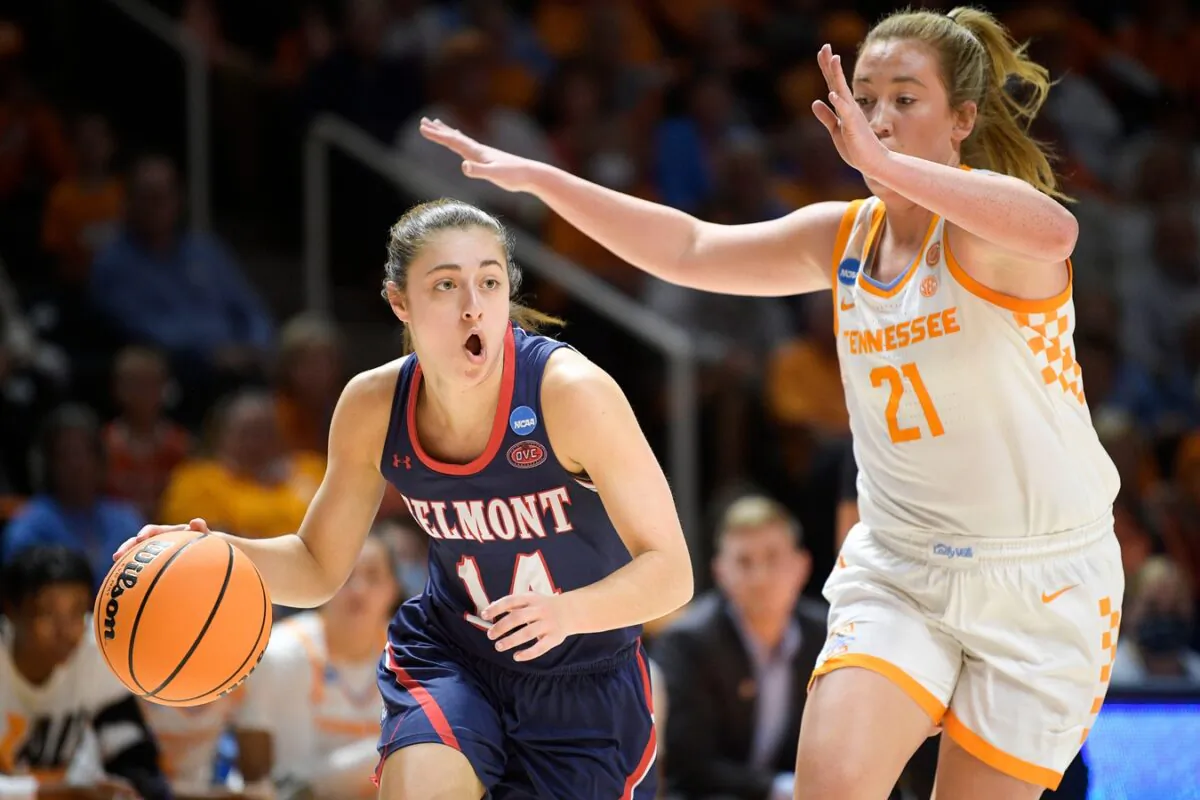 Belmont guard Jamilyn Kinney (14) dribbles the ball as Tennessee guard/forward Tess Darby (21) defends during an NCAA game at Thompson-Boling Arena in Knoxville, Tenn. on March 21, 2022. (Calvin Mattheis/News Sentinel/USA TODAY NETWORK via Field Level Media)