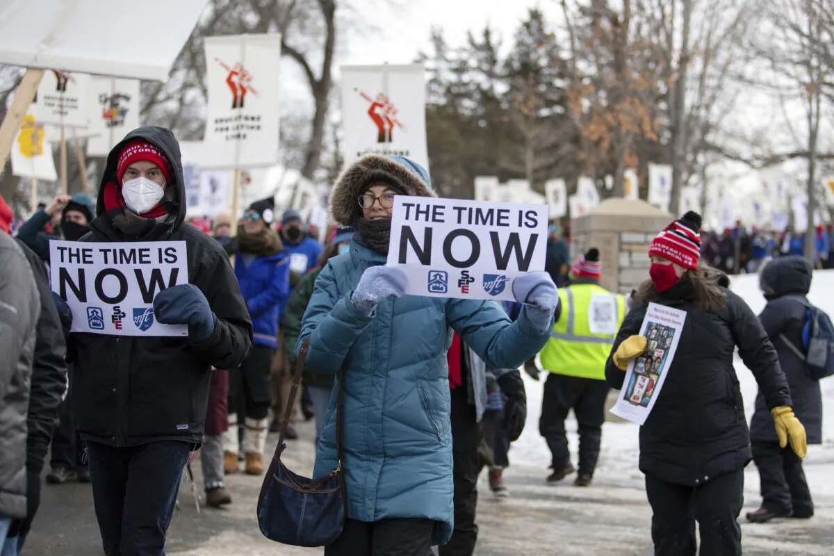 Twin City Teachers and their supporters march in Minneapolis on Feb. 12, 2022 (Hannah Hobus/Pioneer Press via AP)