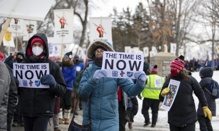 Twin City Teachers and their supporters march in Minneapolis on Feb. 12, 2022 (Hannah Hobus/Pioneer Press via AP)