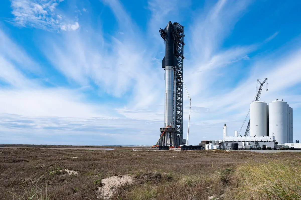 SpaceX's first orbital Starship SN20 is stacked atop its massive Super Heavy Booster 4 at the company's Starbase facility near Boca Chica Village in South Texas on Feb. 10, 2022. (Jim Watson/AFP via Getty Images)