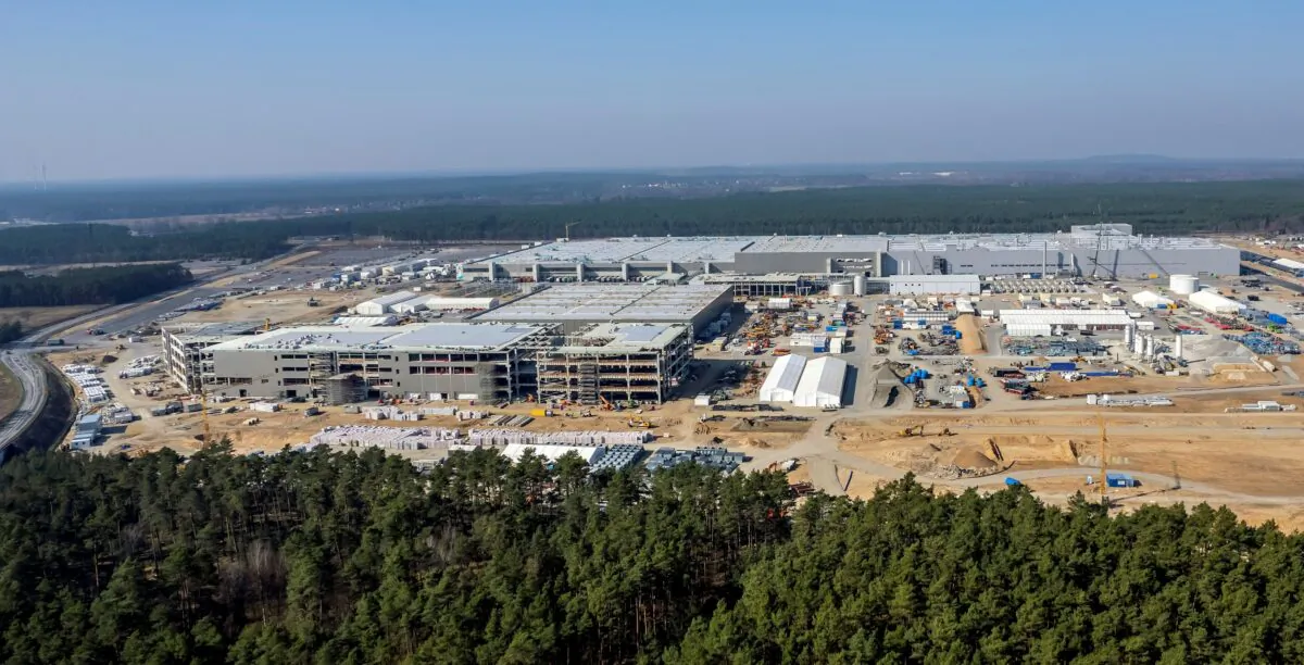 Tesla cars are seen parked at the construction site of the new Tesla Gigafactory for electric cars in Gruenheide, Germany, on March 20, 2022. (Hannibal Hanschke/Reuters)