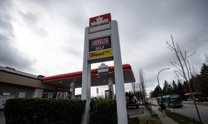 A sign displays $1.87 as the price of a litre of regular grade gasoline at a Petro-Canada gas station in Burnaby, B.C., on March 2, 2022. (Darryl Dyck/The Canadian Press)