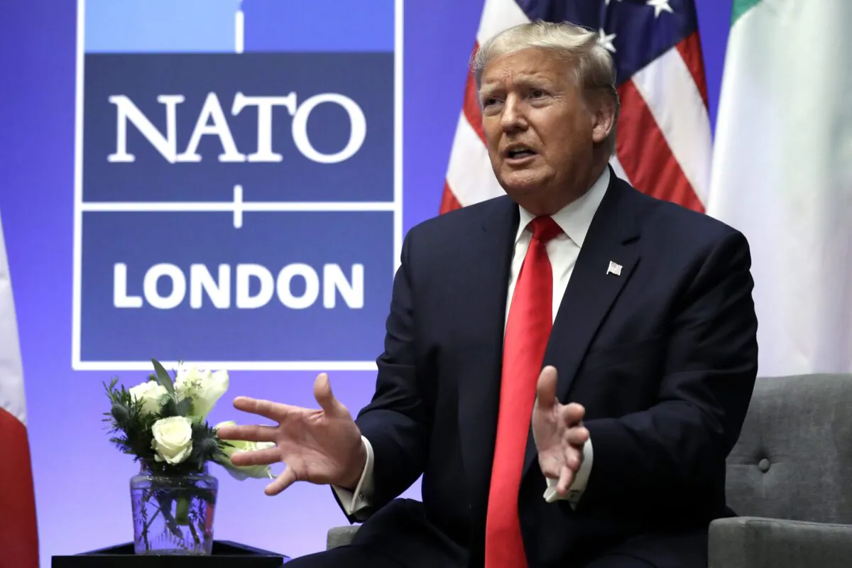 President Donald Trump speaks at an event during the NATO summit at The Grove in Watford, England, on Dec. 4, 2019. (AP Photo/Evan Vucci)