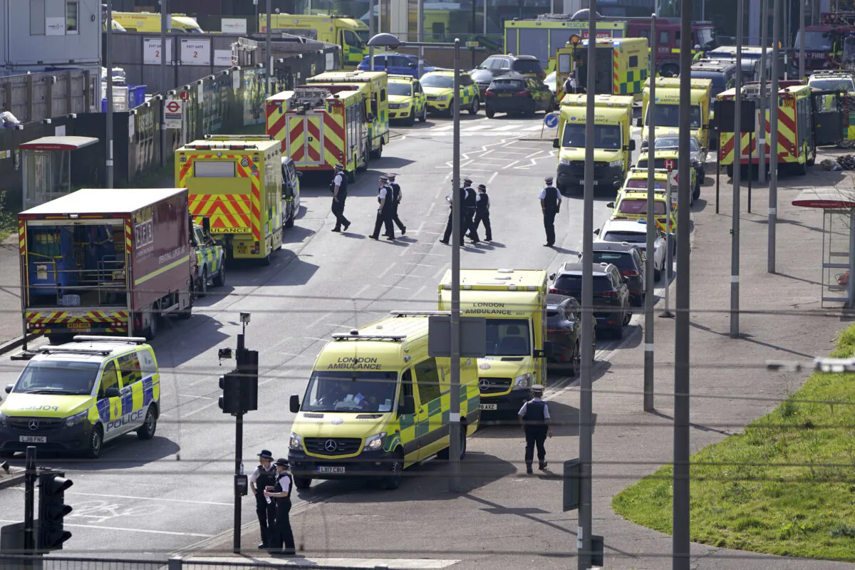Emergency services near the Aquatics Centre, at the Queen Elizabeth Olympic Park in London, on March 23, 2022. (Kirsty O'Connor/PA via AP)