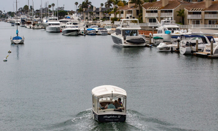 People enjoy boating activities in the harbor of Newport Beach, Calif., on June 3, 2021. (John Fredricks/The Epoch Times)