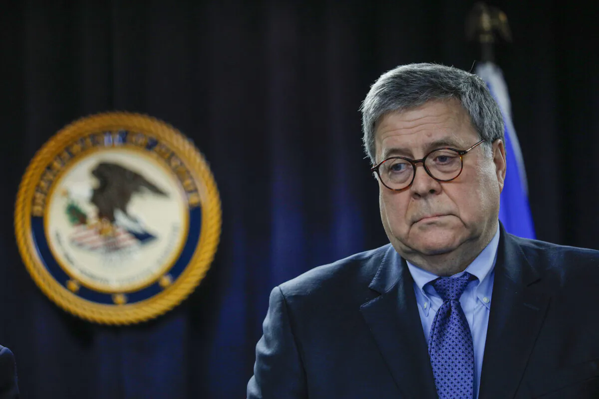 U.S. Attorney General William Barr waits to speak at an announcement of a new Crime Reduction Initiative designed to reduce crime in Detroit in Detroit, Mich., on Dec. 18, 2019. (Bill Pugliano/Getty Images)