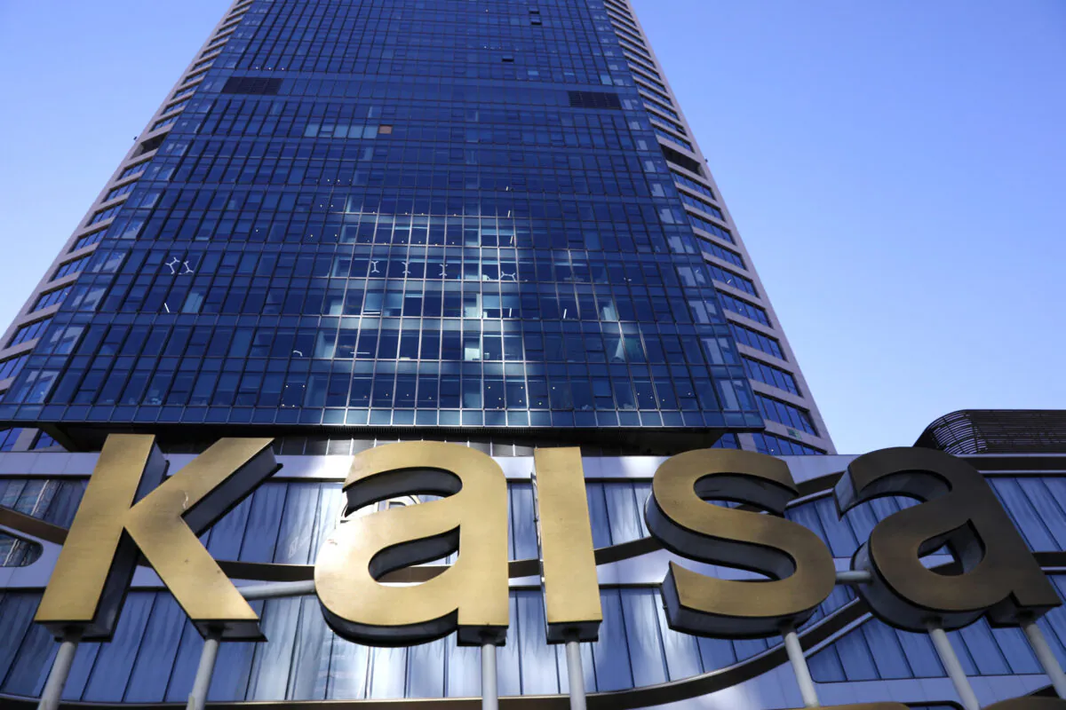 A sign of the Kaisa Plaza, a real estate property developed by Kaisa Group Holdings, is seen in Beijing, China on Dec. 1, 2021. (Tingshu Wang/Reuters)