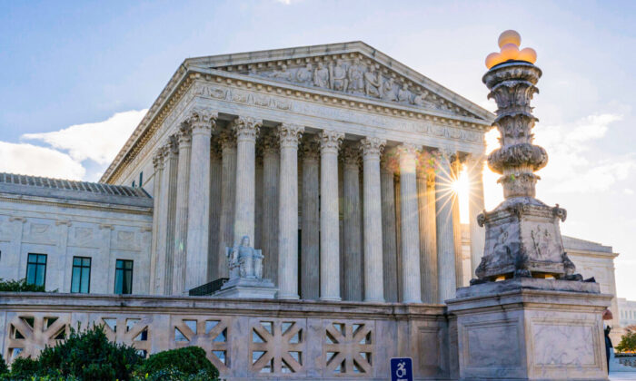The sun rises behind the U.S. Supreme Court in Washington on Nov. 10, 2020. (AP Photo/Alex Brandon, File)