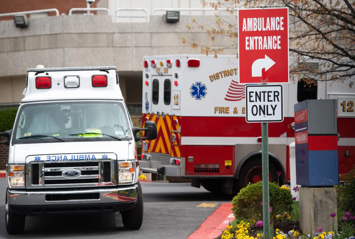 Ambulances sit outside the emergency room at Washington Hospital Center in Washington on April 7, 2020. (Saul Loeb/AFP via Getty Images)