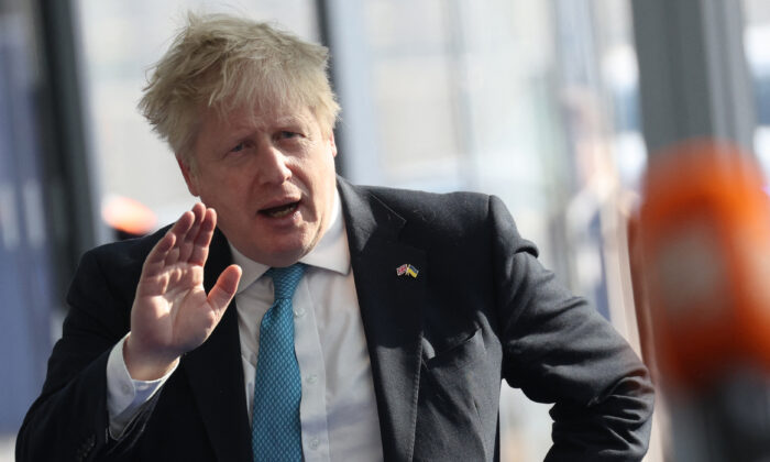Britain's Prime Minister Boris Johnson arrives ahead of an extraordinary NATO summit at NATO Headquarters in Brussels on March 24, 2022. (Kenzo Tribouillard/AFP via Getty Images)