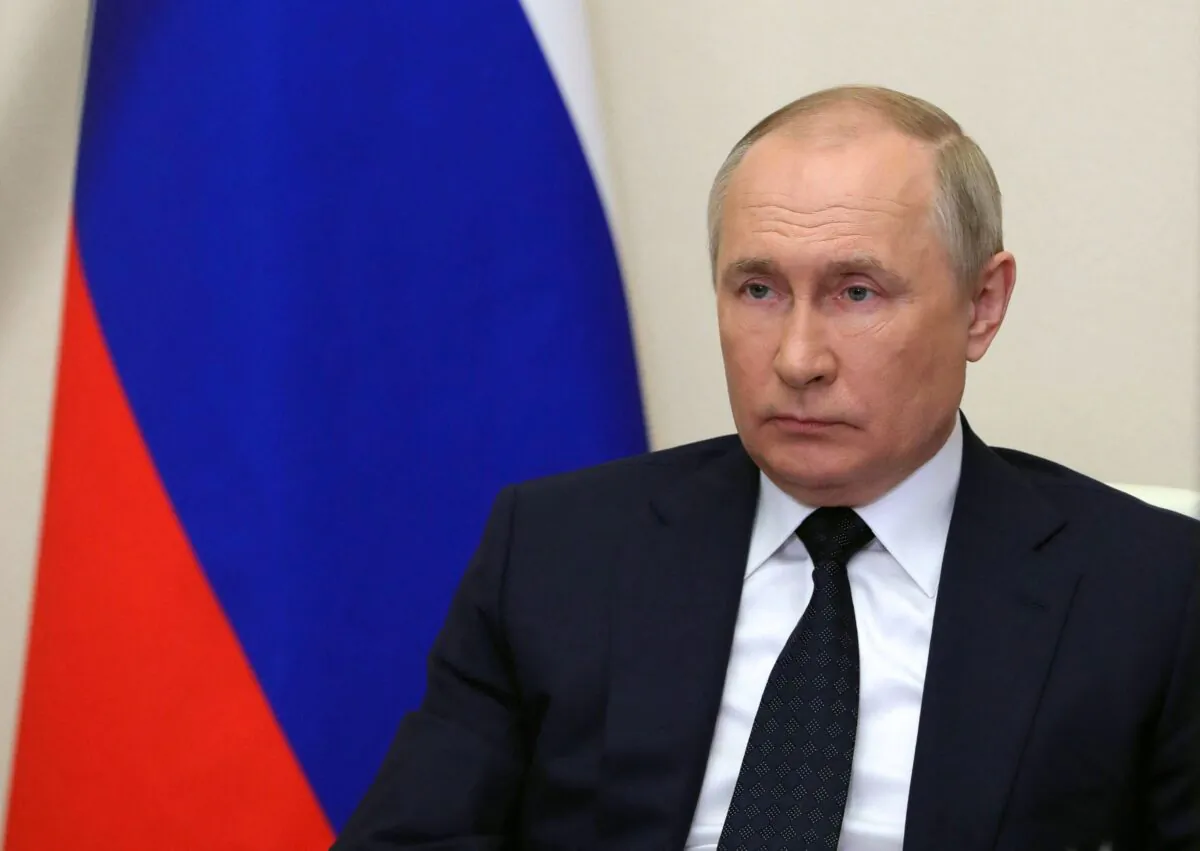 Russian President Vladimir Putin chairs a government meeting via a video link at the Novo-Ogaryovo state residence outside Moscow on March 23, 2022. Putin has demanded that European nations to pay for their natural gas purchases from Russia in rubles. (Mikhail Klimentyev/Sputnik/AFP via Getty Images)