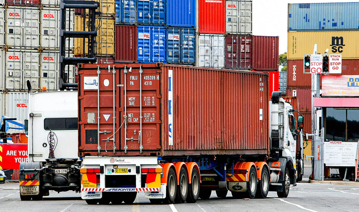 Container trucks arrive at Port Botany's maritime dock near Sydney on November 26, 2008. (GREG WOOD/Getty Images)