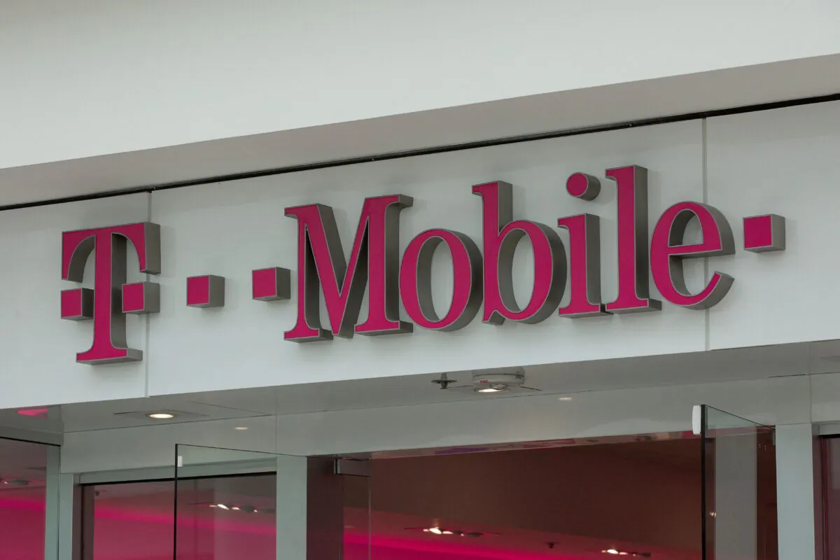 The T-Mobile logo is seen outside a shop in Wash., on July 26, 2019. (Alastair Pike/AFP via Getty Images)