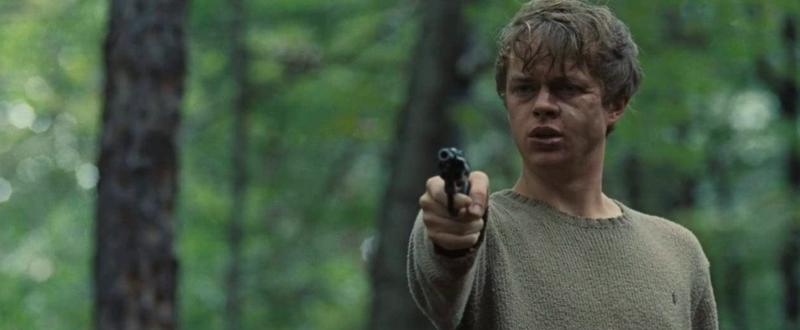 young man points pistol in THE PLACE BEYOND THE PINES