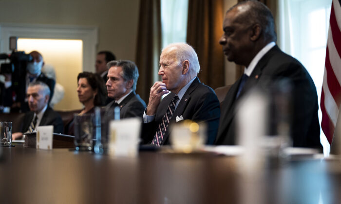 (L-R) U.S. Ambassador to Colombia Philip Goldberg, Commerce Secretary Gina Raimondo, Secretary of State Antony Blinken, President Joe Biden, and Defense Secretary Lloyd Austin meet with Colombian President Ivan Duque at the White House on March 10, 2022. The leaders spoke about recent meetings between the U.S. and Venezuela, where the possibility of easing U.S. oil sanctions on Venezuela were discussed after Biden had banned Russian oil imports to the U.S. (Doug Mills/Pool/Getty Images)