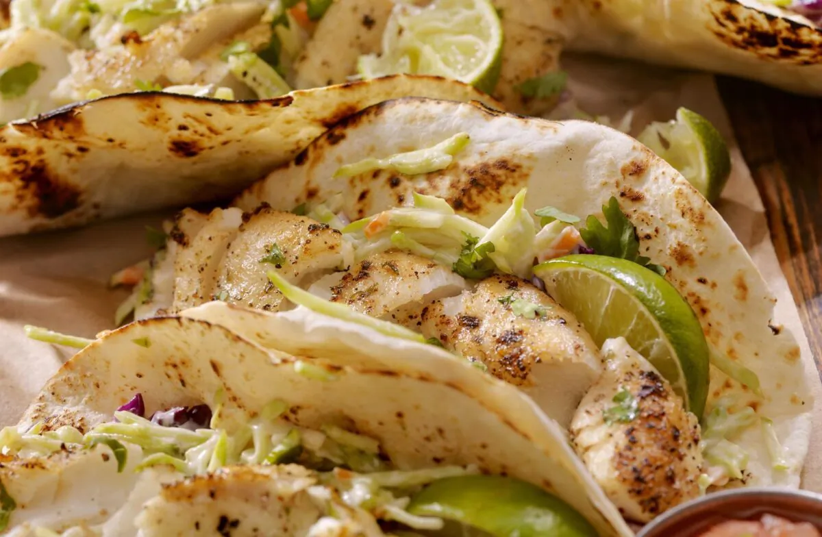 Fish Tacos With Apple Slaw. (LauriPatterson/iStock via Getty Images Plus)