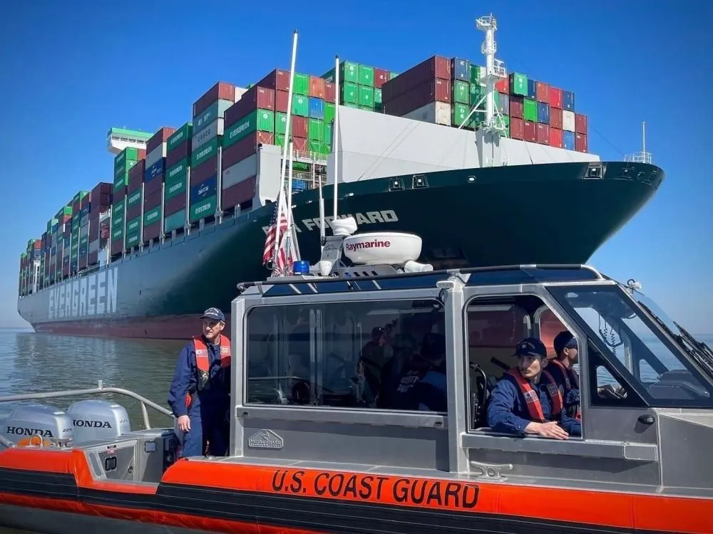 Capt. David O’Connell, the sector commander of Coast Guard Sector Maryland - National Capital Region, and crew members from Coast Guard Station Curtis Bay monitor the grounded vessel, the Ever Forward, Wednesday, March 16, 2022, in the Chesapeake Bay. (U.S. Coast Guard photo by Petty Officer 3rd Class Breanna Centeno/Released)