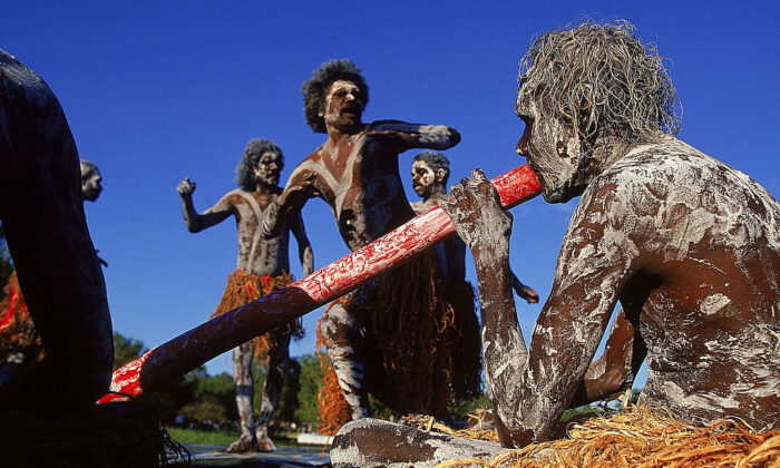 Aboriginal dancers perform during the 2000 Sydney Olympic Torch Relay at Yellow Water in Kakadu National Park, Northern Territory, Australia on 29 June 2000.  (Adam Pretty/ALLSPORT)
