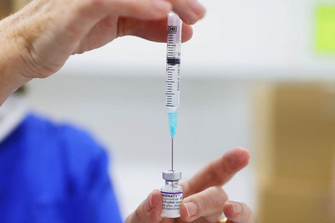A COVID-19 vaccine is prepared at Sydney Road Family Medical Practice in Balgowlah in Sydney, Australia on Jan. 10, 2022. (Jenny Evans/Getty Images)