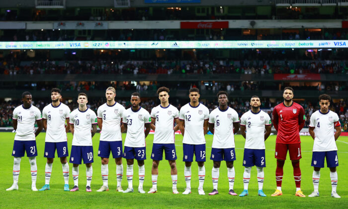 Players of United States pose during the national anthem ceremony before a match between Mexico and United States as part of Concacaf 2022 FIFA World Cup Qualifiers at Azteca Stadium, in Mexico City, on March 24, 2022. (Hector Vivas/Getty Images)
