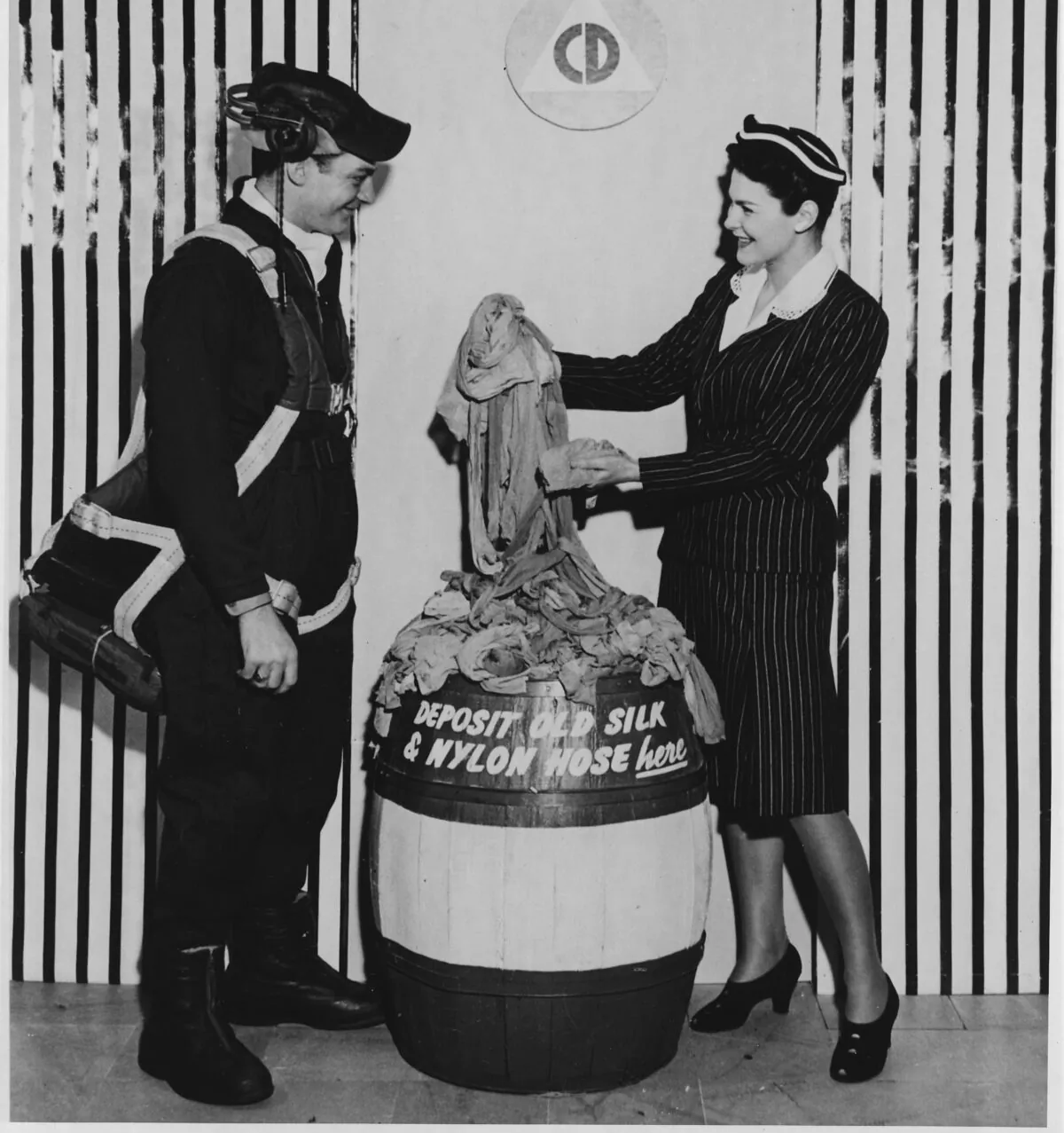Worn-out nylon and silk stockings were collected, reprocessed, and made into parachutes for army fliers, tow ropes for gilder planes, and other war material. (U.S. National Archives and Records Administration via Wikimedia Commons)