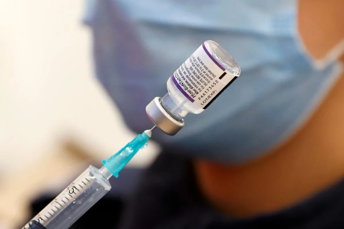 A medic prepares a dose of the Pfizer-BioNTech COVID-19 vaccine in Netanya, Israel, on Jan. 5, 2022. (Jack Guez/AFP via Getty Images)