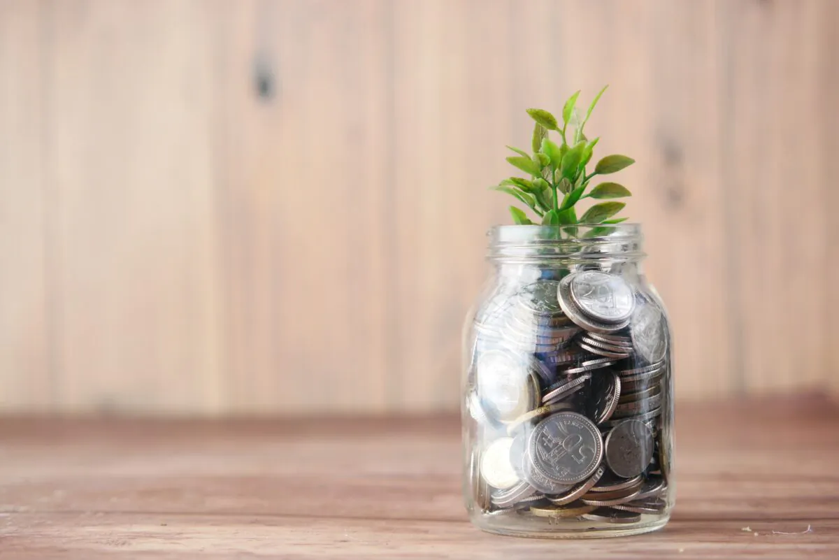 Stock photo of a jar of coins. (Towfiqu barbhuiya/Pexels)