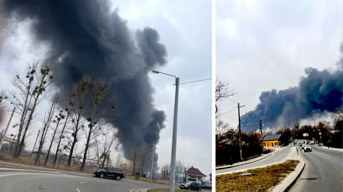 Plumes of smoke are seen after what officials said was a missile strike in Lviv, Ukraine, on March 26, 2022. (Charlotte Cuthbertson/Epoch Times)