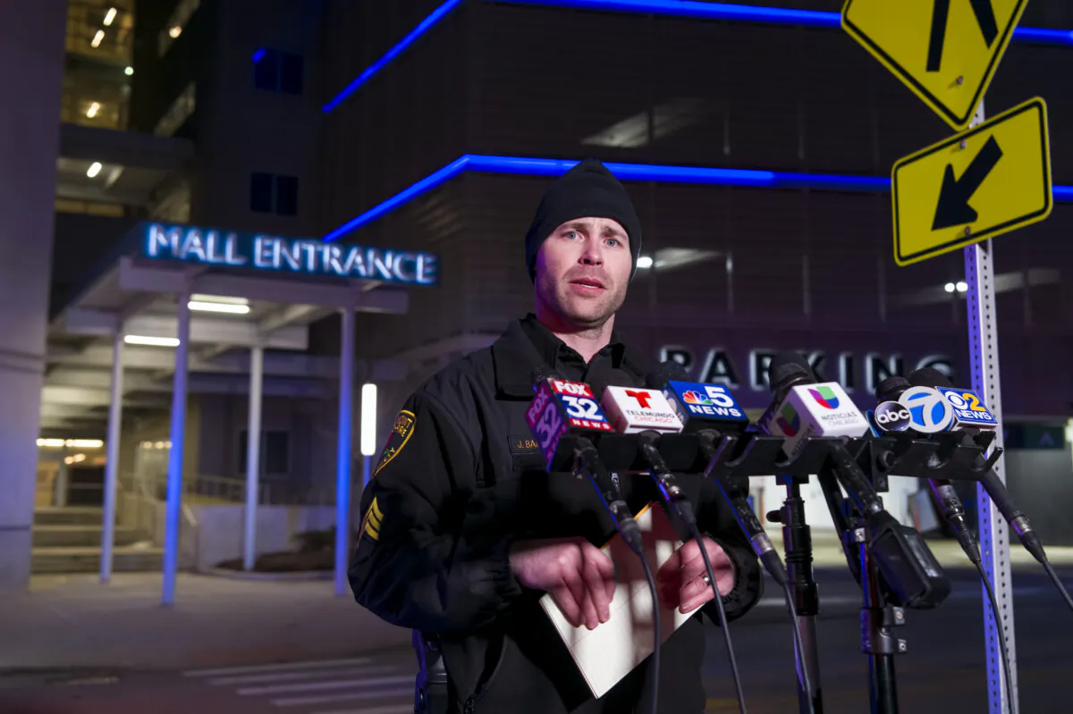 Rosemont Public Safety Department Sgt. Joe Balogh updates the media staged outside the Rosemont Outlet Mall where a fatal shooting occurred inside in Rosemont, Ill., on March 25, 2022. (Tyler Pasciak LaRiviere/Chicago Sun-Times via AP)