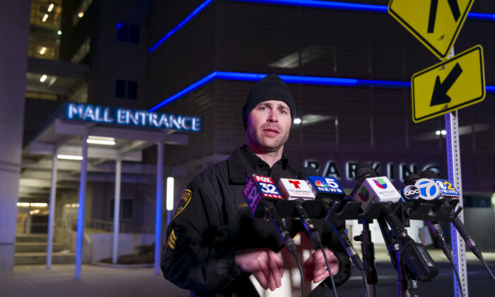 Rosemont Public Safety Department Sgt. Joe Balogh updates the media staged outside the Rosemont Outlet Mall where a fatal shooting occurred inside in Rosemont, Ill., on March 25, 2022. (Tyler Pasciak LaRiviere/Chicago Sun-Times via AP)