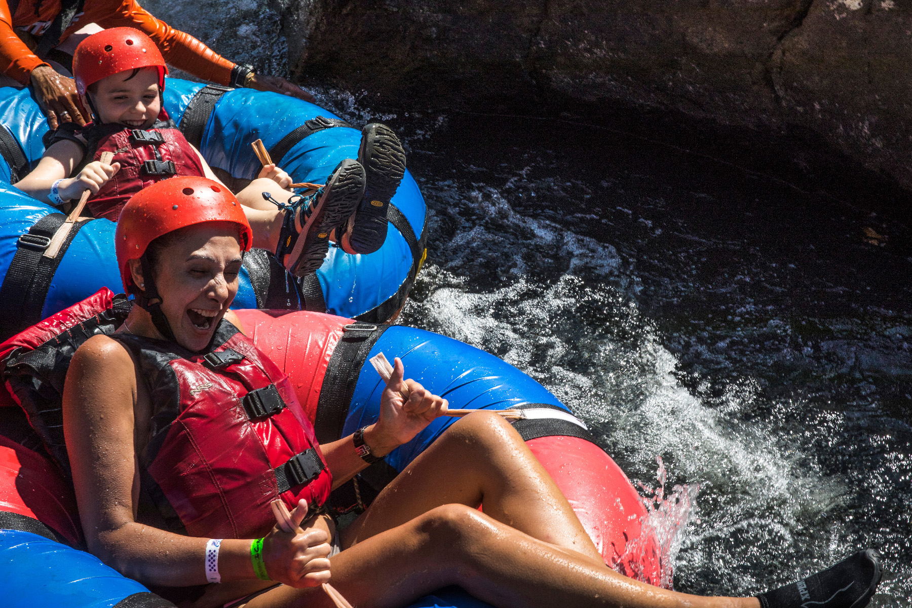 a family whitewater rafting