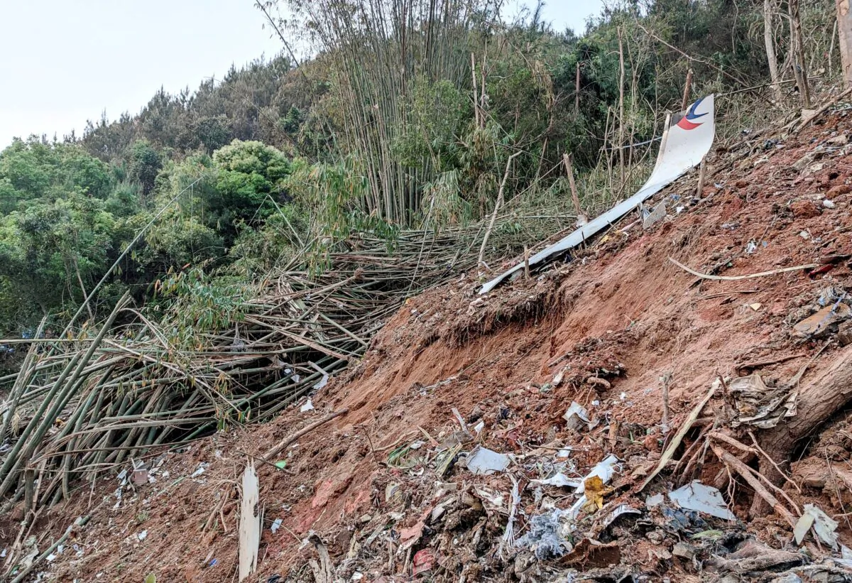 Fragments of wreckage of the China Eastern passenger jet which crashed near Wuzhou in southwestern China's Guangxi Province on March 21, 2022. (CNS/AFP via Getty Images)