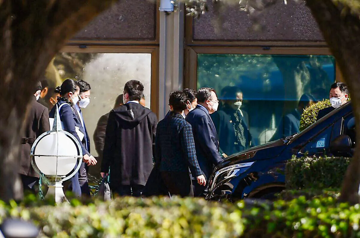 Members of the Chinese diplomatic delegation leave the Cavalieri Waldorf Astoria hotel, where U.S. National Security Adviser Jake Sullivan met with senior Chinese Communist Party diplomat Yang Jiechi, in Rome, on March 14, 2022. (Filippo Monteforte/AFP via Getty Images)