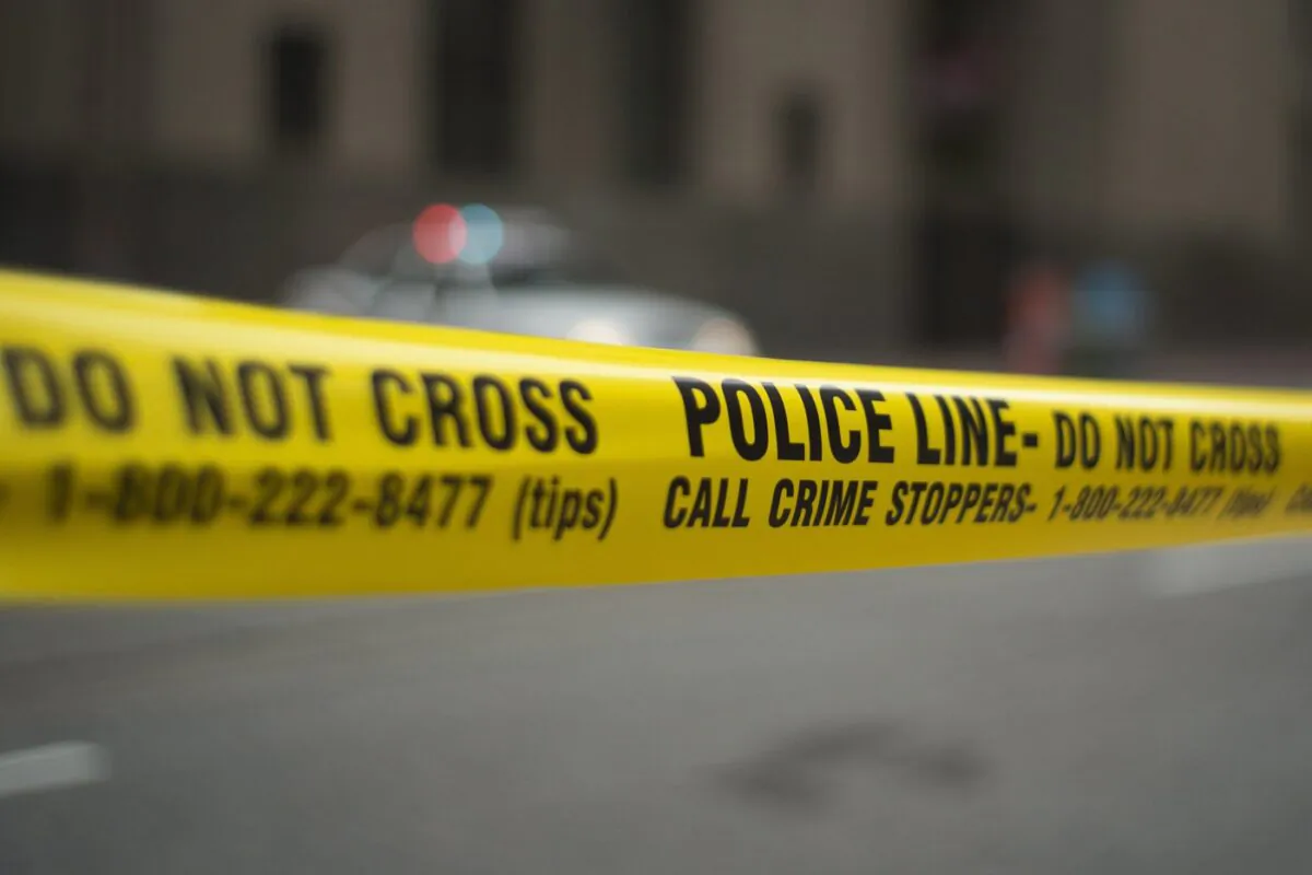 Police tape is shown in Toronto on May 2, 2017. (Graeme Roy/The Canadian Press)