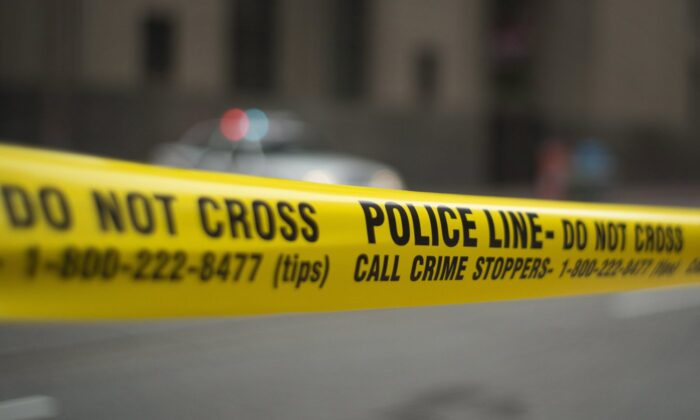 Police tape is shown in Toronto in a file photo. (The Canadian Press/Graeme Roy)