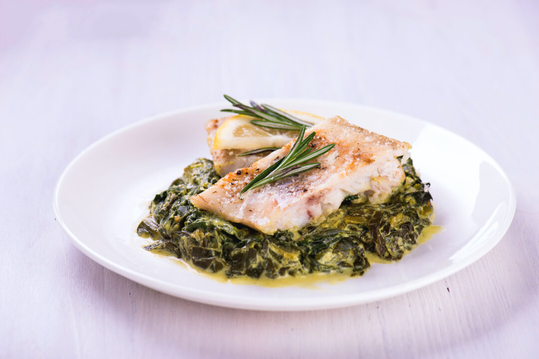 Fresh fish with baby spinach and dill, is a simple springtime meal in one dish.(elenamazur/Shutterstock)