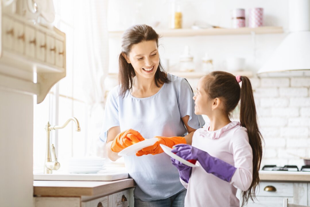 Even the simplest of actions like washing dishes can be an act of love. (Prostock-studio/Shutterstock)