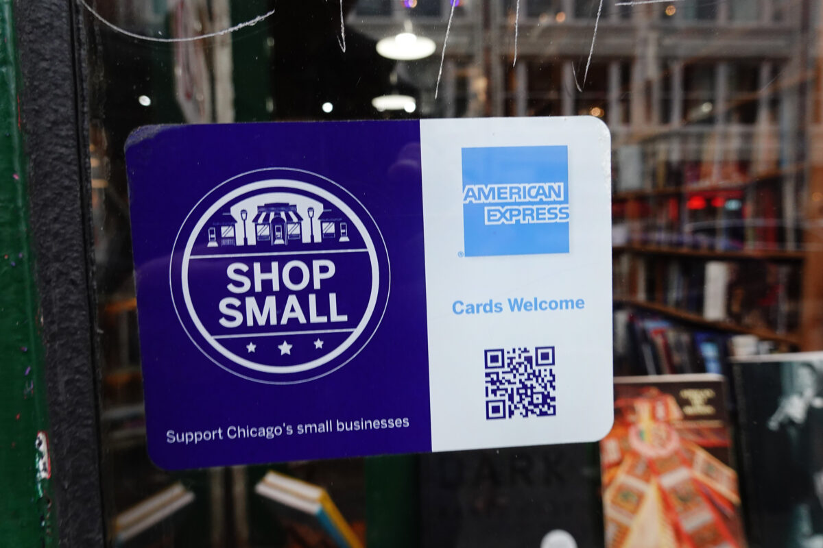 An American Express sticker pasted at the entrance of a business in Chicago, on Jan. 24, 2020. (Scott Olson/Getty Images)