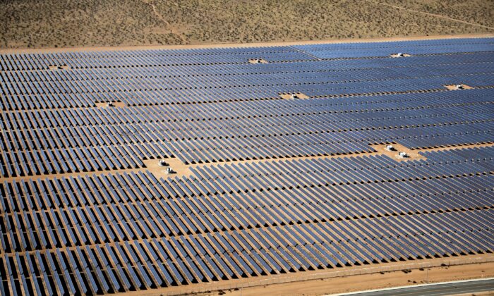 An array of solar panels is seen in the desert near Victorville, Calif., on March 28, 2018. (Lucy Nicholson/Reuters)