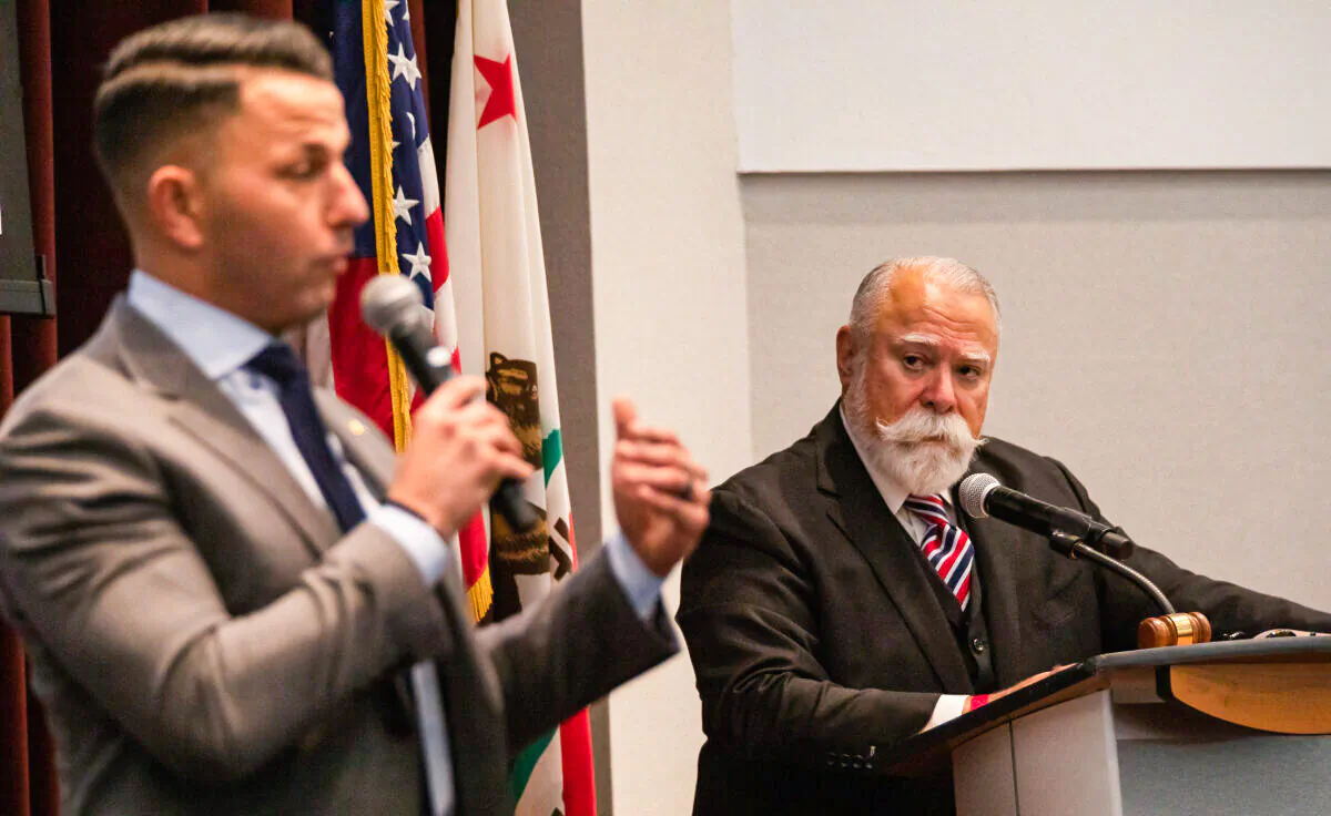 U.S. Senate candidate Cordie Williams (L) speaks, with mayor pro tem of Yorba Linda Gene Hernandez moderating, at a “Meet the Candidates” forum at the Yorba Linda Community Center in Yorba Linda, Calif., on March 24, 2022. (John Fredricks/The Epoch Times)