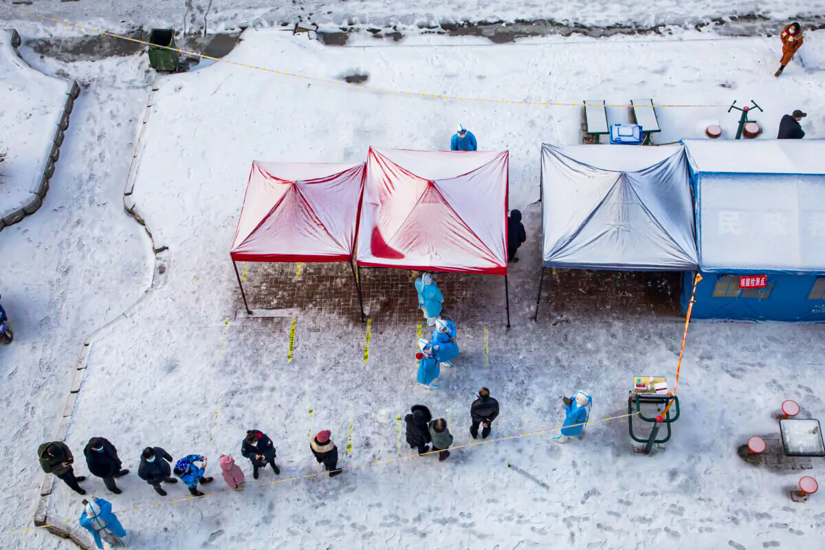 Residents queue for COVID-19 PCT testing in Jilin city in China's northeastern Jilin Province on March 15, 2022. (STR/AFP via Getty Images)