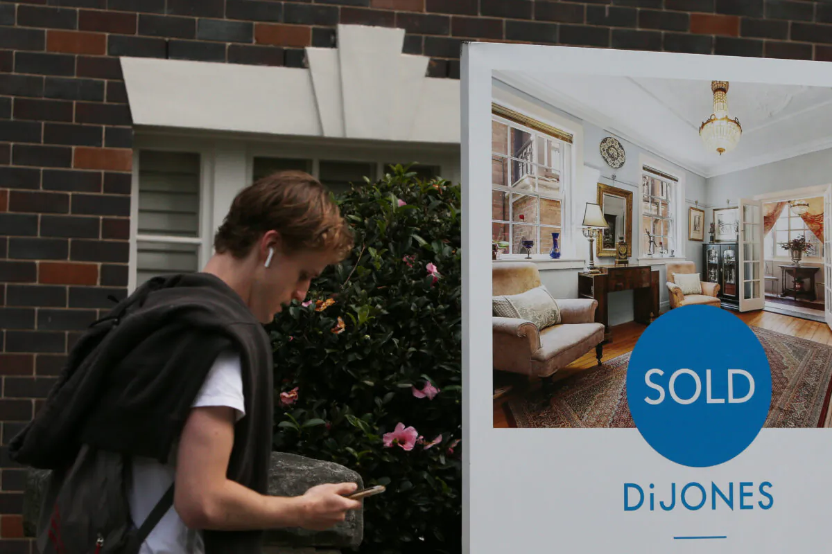 A "sold" real estate sign is seen outside a high-rise apartment block in the suburb Kirribilli in Sydney, Australia, on May 8, 2021. (Lisa Maree Williams/Getty Images)